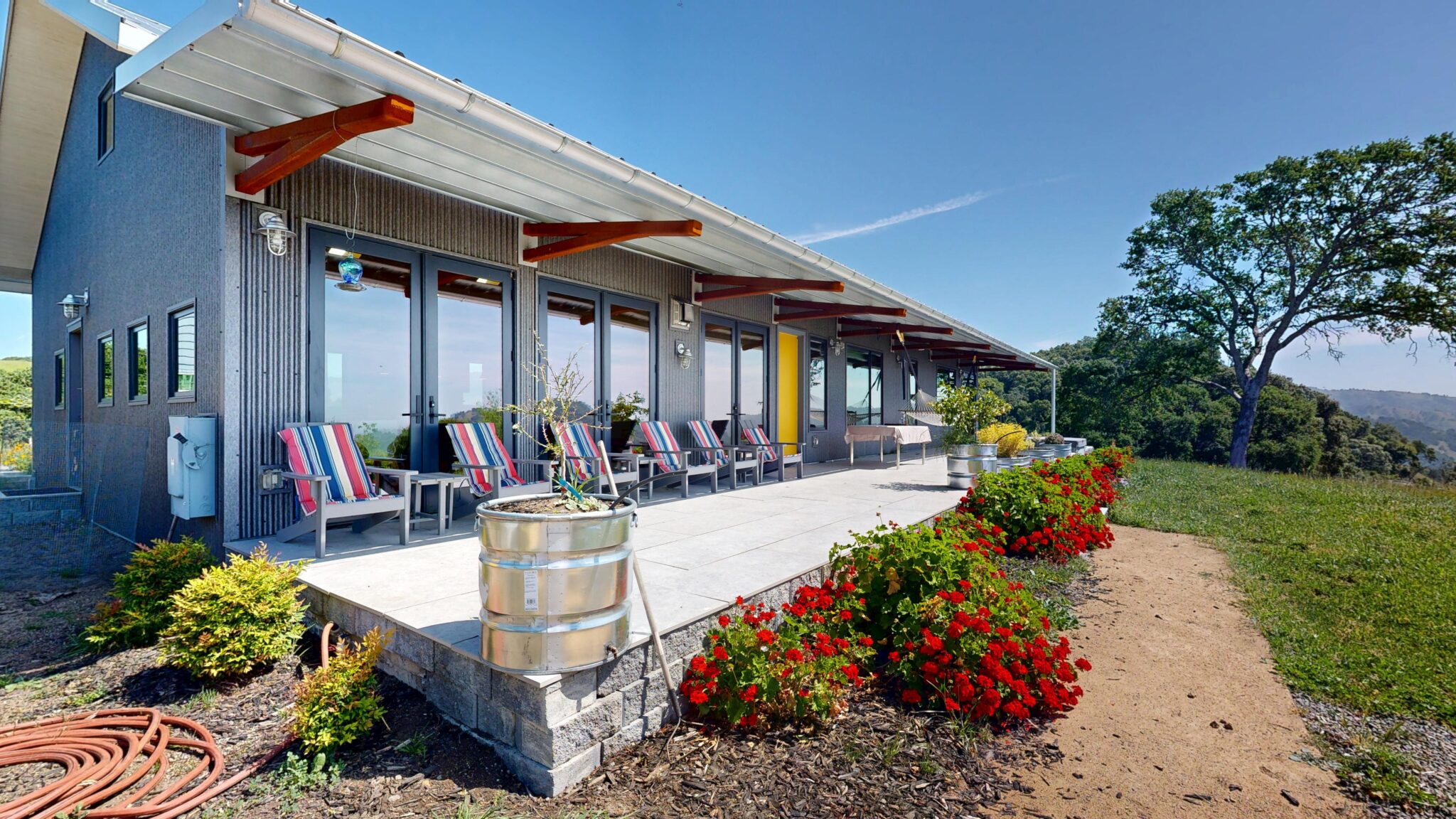 Modern custom home exterior and patio built by Black Creek Builders in Napa, featuring contemporary design and scenic views.